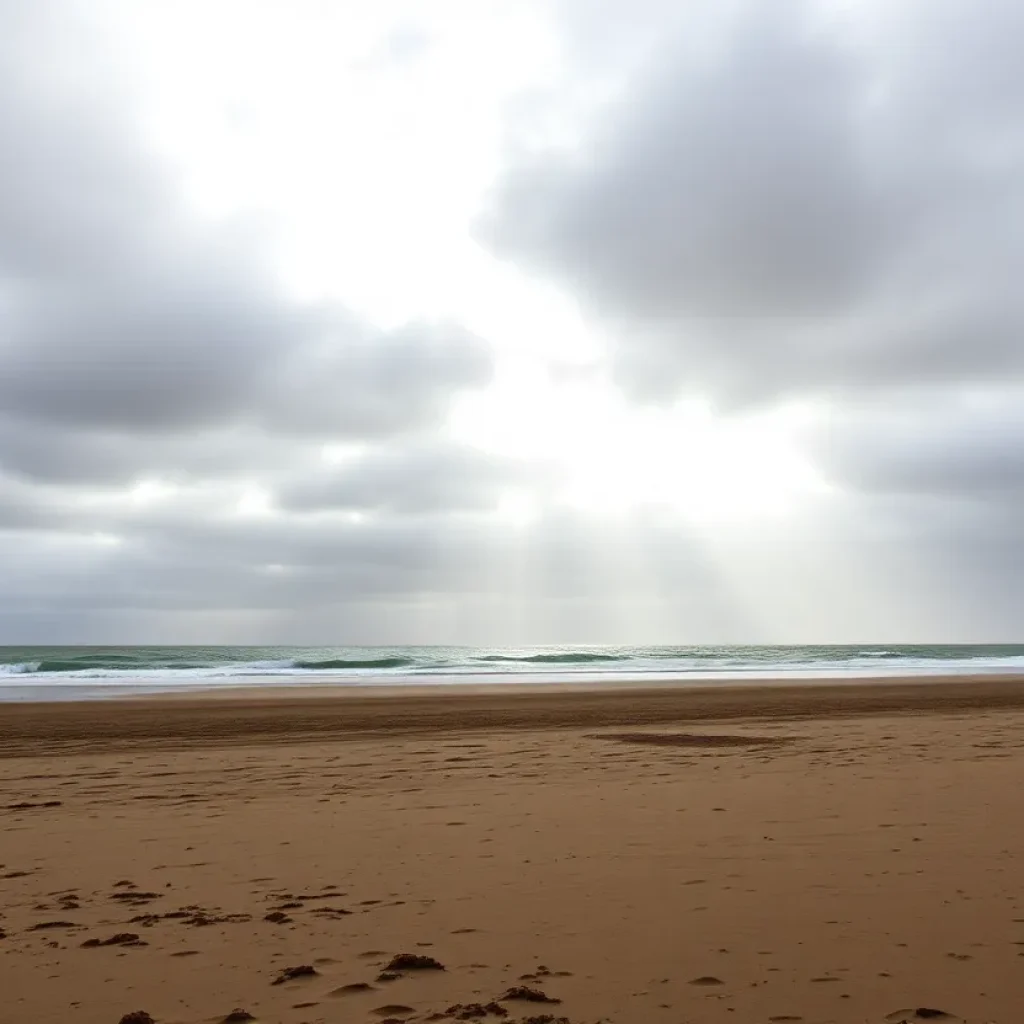 A cloudy Southern California beach with slight drizzle