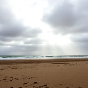A cloudy Southern California beach with slight drizzle