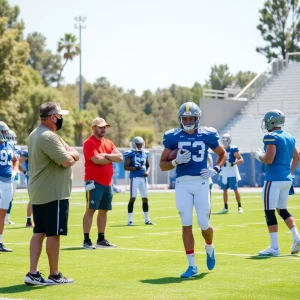 UCLA football players practicing at training camp